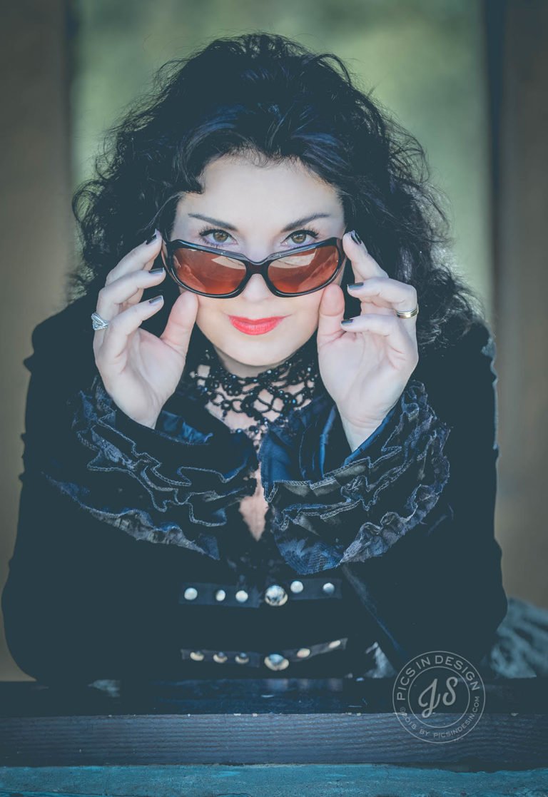 Author Manuela Schneider with Sunglasses Down - Photo by J.Sadeeh
