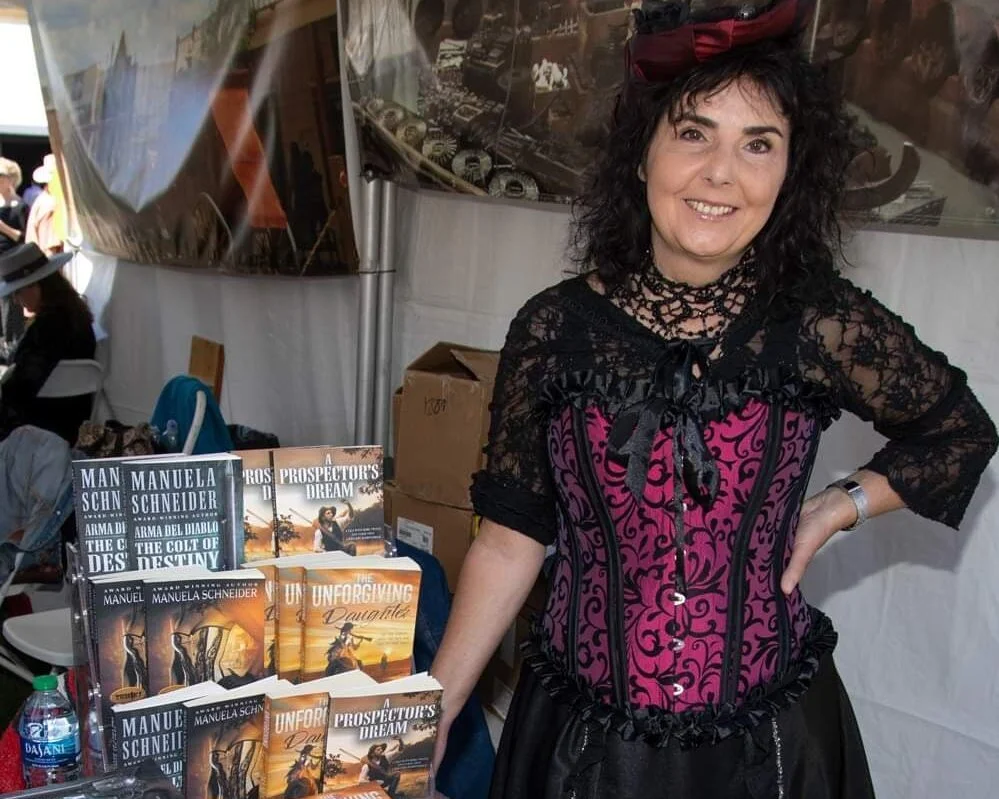 Manuela Schneider at Book Signing Table